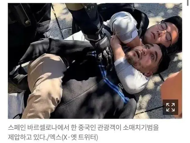 바르셀로나에서 소매치기범을 제압하는 중국인 (2)
